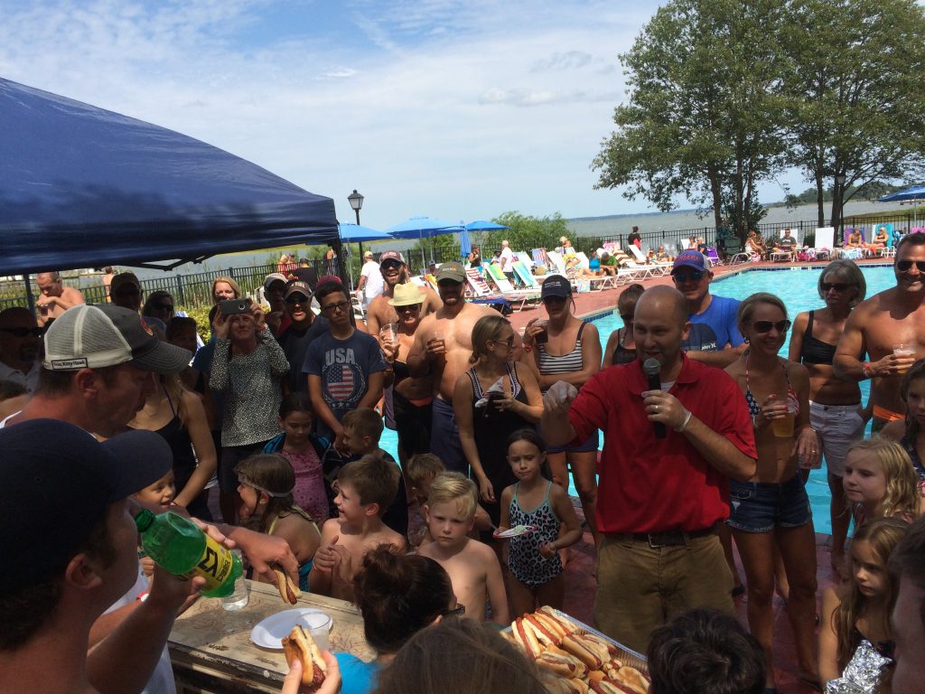 In line for food at the yacht club pool