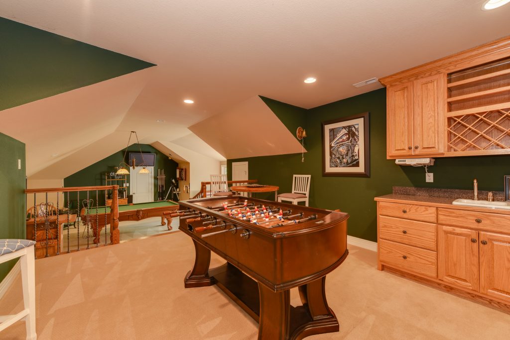game room with foosball 