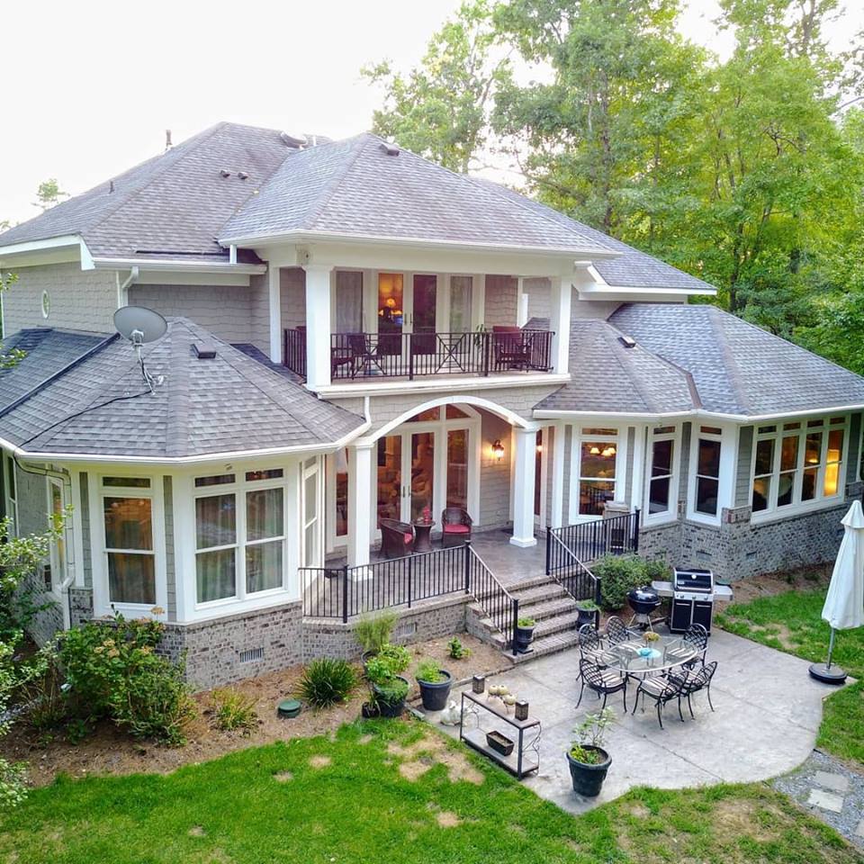 Large home back yard with patio